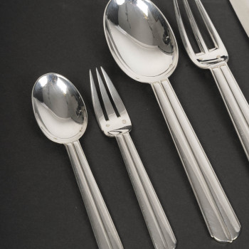 JEAN E. PUIFORCAT – 146-piece solid silver flatware set, "BIARRITZ" pattern, circa 1930