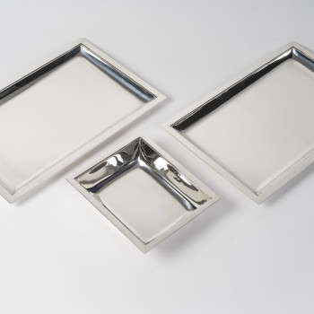 JEAN E. PUIFORCAT – Set of two rectangular platters and a bowl in solid silver, Art Deco period