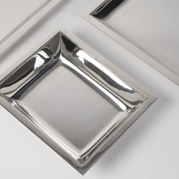 JEAN E. PUIFORCAT – Set of two rectangular platters and a bowl in solid silver, Art Deco period