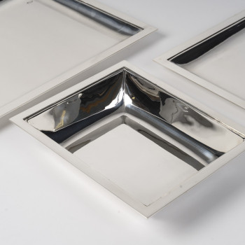 JEAN E. PUIFORCAT – Set of two rectangular platters and a bowl in solid silver, Art Deco period