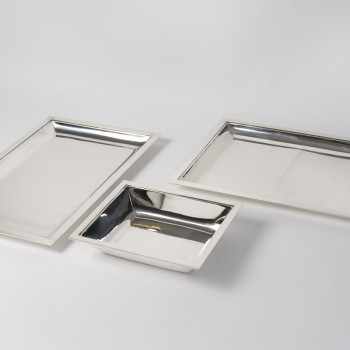 JEAN E. PUIFORCAT – Set of two rectangular platters and a bowl in solid silver, Art Deco period