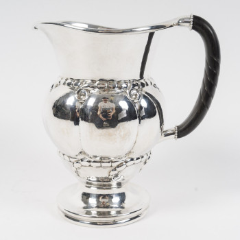 GEORG JENSEN - Water pitcher - model 7A, known as the "Melon Pitcher," created in 1907. Denmark,...