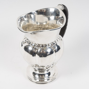 GEORG JENSEN - Water pitcher - model 7A, known as the "Melon Pitcher," created in 1907. Denmark,...
