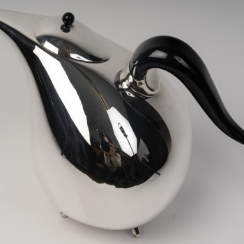 Silver covered pitcher with a sculptural silhouette, Pomellato – Milan, 20th century (1985–1990)