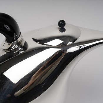 Silver covered pitcher with a sculptural silhouette, Pomellato – Milan, 20th century (1985–1990)