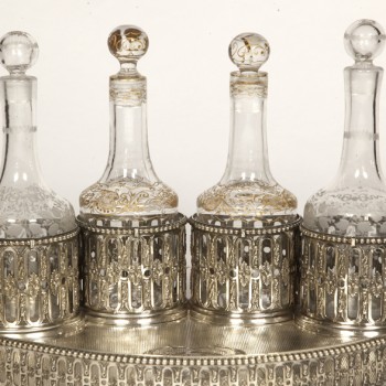 Goldsmith ODIOT - Cabaret in sterling silver and 4 19th century crystal bottles
