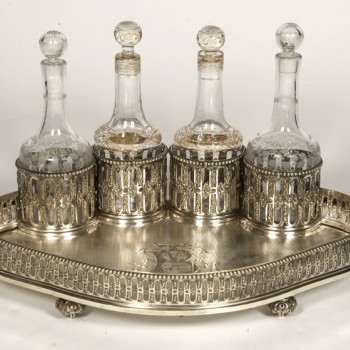 Goldsmith ODIOT - Cabaret in sterling silver and 4 19th century crystal bottles