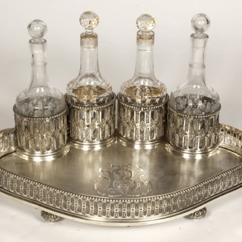 Goldsmith ODIOT - Cabaret in sterling silver and 4 19th century crystal bottles