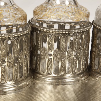Goldsmith ODIOT - Cabaret in sterling silver and 4 19th century crystal bottles